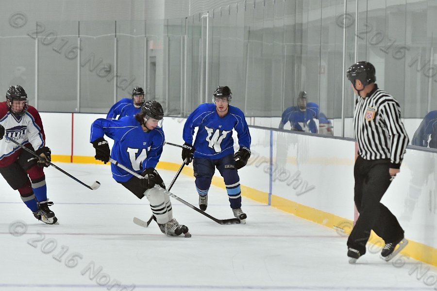 Wheaton College Men\'s Ice Hockey vs Middlesex Community College. - Photo By: KEITH NORDSTROM